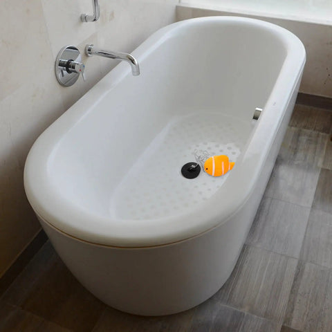 Fish Bathtub Drain Stopper with Chain Rubber for Shower Drains in a modern white tub with orange fish decoration.