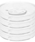 Stack of four white round Four Piece Pitcher Pump Gasket Set For Hand Water Pumps White PVC Sealing Gaskets Sturdy Replacement Parts
