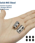 Hand holding 2 Pack 6mm To 6mm Bore Steel Rigid Shaft Coupling For Heavy Duty Precision Alignment with M4 Set Screws visible