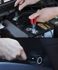 Hands connecting a Heavy Duty Five Watt Solar Battery Trickle Charger With Overcharge Guard to car battery terminals.
