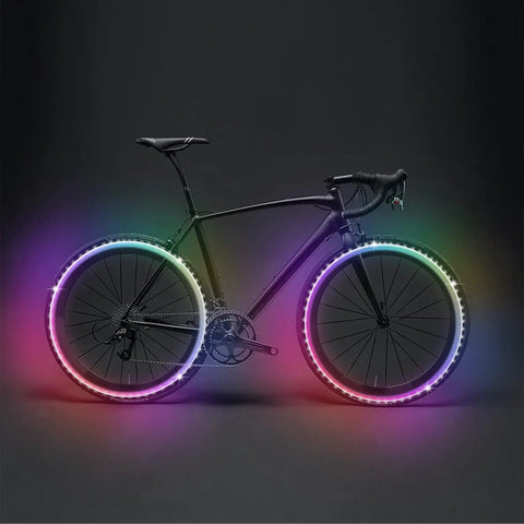 Bike with Battery Powered LED Strip Lights 13ft USB And Battery Operated RGB Color Changing LEDs creating colorful wheel glow