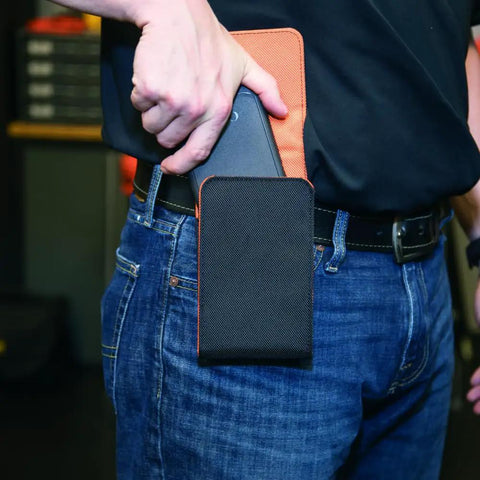 Person using XX Large Phone Holder With Magnetic Closure And Belt Clip Fits iPhone Google LG Samsung Phones In Or Out Of Case