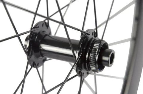 Close-up of hub on 60mm Carbon Road Disc Clincher Wheelset For Fast Sprinting And Smooth Climbs 700C Rim Matte 23mm Width Center Lock Hubs