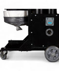 Rock Solid Three Motor HEPA Dust Collector With Reverse Air Jet Pulse Filter Cleaner Built For Demanding Shops Hella Powerful 110V Industrial Extraction Tool side view showing filters and wheels.
