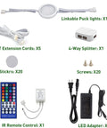 Under Cabinet LED Light Kit Dope 24V RGBW Puck Lights, Remote, Adapters, and Accessories Displayed