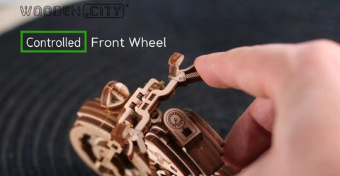 Close-up of Cruiser V-Twin 3D Puzzle Kit for Adults showing controlled front wheel feature in wooden motorcycle model build.