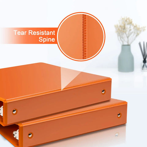 Close-up of two bright orange 1.5 inch 3 ring binders with clear view cover, showcasing tear resistant spine, part of 6 pack.