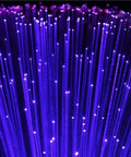 Close-up view of illuminated fiber optic strands from Fiber Optic Star Light Kit With 150 Strands 0.75mm, 6.5ft, for car decor.