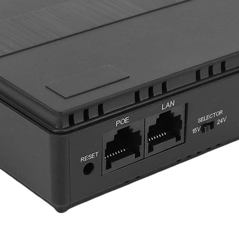 Dont Stress Over Power Outages With This Compact Mini Ups Backup Power Supply Packing 8800mah Capacity And 18w Output To Keep Routers Modems And Security Cameras Running Smoothly, close-up view of ports and connectors.