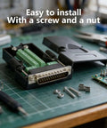 Open DB25 Solderless Male Adapter For RS232 D Sub Serial To 25 Pin Port Connector with case, bolts, and nuts on workbench
