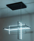 Modern Black 3 Light LED Chandelier With Remote Control Dimmable Color Changing Pendant Lighting For Dining Room Living Room And Kitchen Island Rectangle Frame Fixture showcasing illuminated geometric frames.