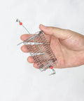 Person holding small piece of Ten Pieces Stainless Steel Fishing Bait Cage Feeder Set With S M L Sizes Rust Resistant Cage Traps