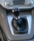 Upgrade Your Ford Transit Tourneo Gear Shifter With This Heavy Duty Manual Knob For 2012 To 2021 Custom Models Featuring A Contoured Grip And Secure Fit For Smooth Day To Day Drives. Black 6-speed manual knob with leather boot in Ford Transit Tourneo console.