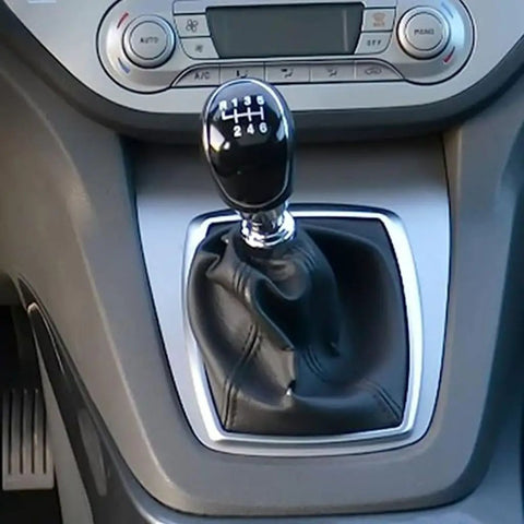 Upgrade Your Ford Transit Tourneo Gear Shifter With This Heavy Duty Manual Knob For 2012 To 2021 Custom Models Featuring A Contoured Grip And Secure Fit For Smooth Day To Day Drives. Black 6-speed manual knob with leather boot in Ford Transit Tourneo console.
