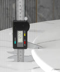 Caliper measuring 12mm thickness of Round Rotating Serving Plate With Non Slip Marble Surface 12mm Thick Lazy Susan Kitchen Turntable