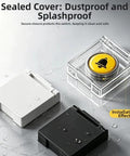 Three Pack Appliance Button Covers With Safe Flip Lid showing clear, black, and white covers on wet surface.