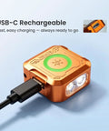 SE1 Keychain Flashlight Compact 300 Lumen EDC Light With UV Light And RGB Modes connected to USB-C charger