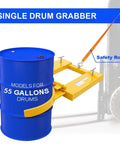 Heavy Duty Dmc Drum Grabber With 1500 Lbs Capacity Single Fork Mounted Design And Hinged Folding Arms Perfect For Moving 55 Gallon Drums Up To 22.4 Inches Wide While Saving Space And Keeping Your Crew Safe From Back Strain with safety ropes attached.