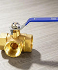 Built Tough Forged Brass Three Way Valve T Type Half Inch Bsp Thread Heavy Duty Plumbing Connector with blue handle.