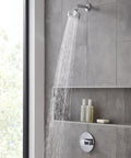 Bauloop Pressure Balance Valve Trim With Cartridge In Starlight Chrome mounted in shower with running water and bath products