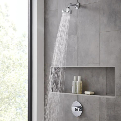 Bauloop Pressure Balance Valve Trim With Cartridge In Starlight Chrome mounted in shower with running water and bath products