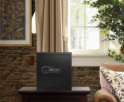 Deluxe Digital Keypad Safe Box For Home Office Hotel And Travel Beefy Steel Alloy Small Safe on a table in living room