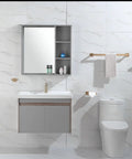 Slick Black And Brushed Gold 5 Piece Bathroom Hardware Set with installed 23.6 inch towel bar in modern bathroom design