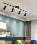 Installed four light black track lighting kit with flexible heads dimmable LED indoor ceiling spotlight mid century modern style