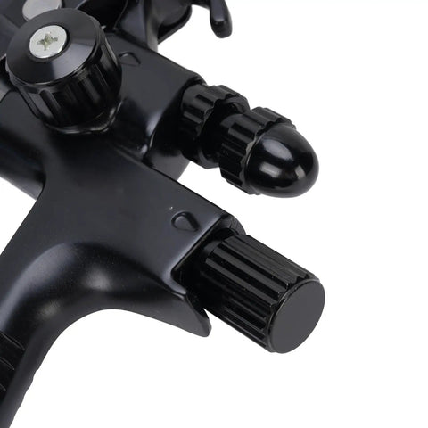 Close-up of Professional Hvlp Air Paint Sprayer Featuring Adjustable Flow Control for home renovation work, showing detailed nozzle and controls.
