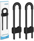 Premium KidSafe Cabinet Locks And Toddler Proof Drawer Latches For Home Security Quick Adhesive Setup Keeps Lil Ones Outta Trouble Without A Hitch In Sturdy 2Pack Black Design, showing two black cabinet locks with a box.