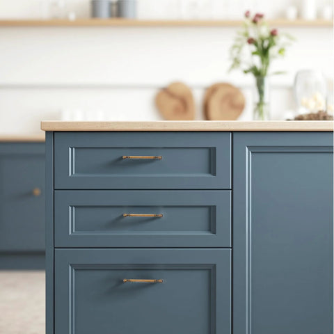 Arch Cabinet Handles in Champagne Bronze on blue kitchen cabinets, 5 inch center to center, European style drawer pulls, zinc alloy hardware.