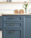 Blue cabinet with Ten Pack 3 Inch Retro Arch Lotus Drawer Pulls Cabinet Handles Antique Brass Hardware For Kitchen