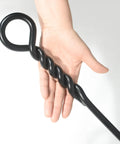 Close-up of hand holding 40 Inch Fire Poker For Fire Pit With Twisted Rope Handle Heavy Duty Handmade Steel Campfire Poker.