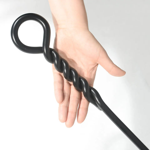 Close-up of hand holding 40 Inch Fire Poker For Fire Pit With Twisted Rope Handle Heavy Duty Handmade Steel Campfire Poker.