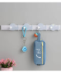 Slick Solid Wood Wall Mount Coat Rack And Key Holder With Smooth Finished Hooks for organizing keys and bags.