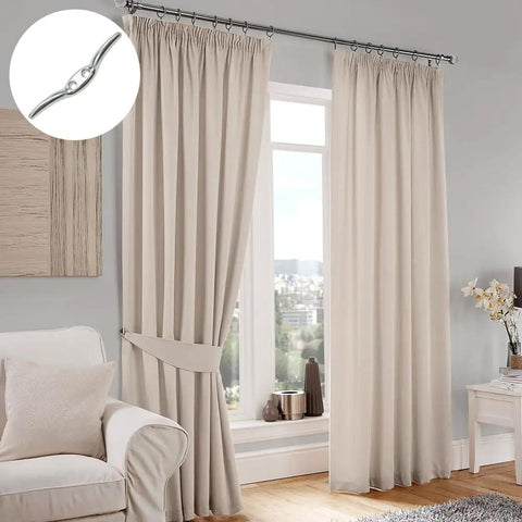 Beige curtains tied with Six Pack Stainless Steel Marine Rope Cleats And Blinds Cord Cleats in a living room.