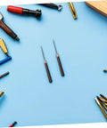 15 Piece Straight Cone Awl Set with Durable Wooden Handle for Leathercraft Sewing and Woodworking, two awls on blue background.