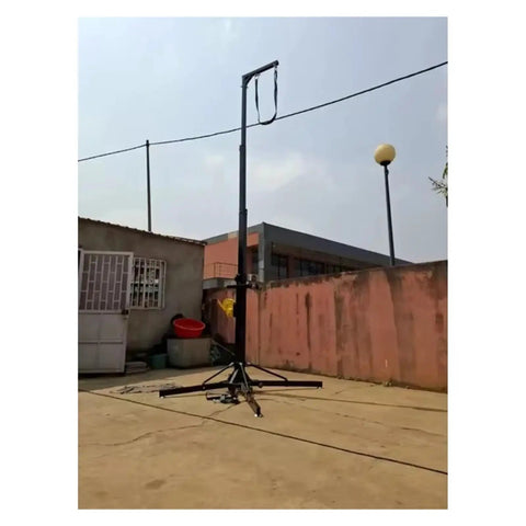 Heavy Duty Crank Lift Tower That Goes Up Without A Hassle, 660 Pound Rugged Telescopic Speaker Stand in outdoor setting.