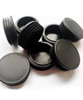 Eight black round plastic tubing end caps 2-3/8 inch for 60mm OD, visible in a grouped layout