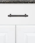 Oil Rubbed Bronze Straight Bar Cabinet Pull 6.63 Inch Length, 5 Inch Hole Center, 1.32 Inch Projection, mounted on white cabinet