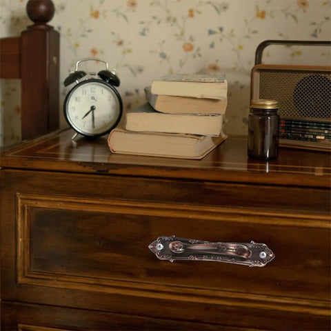 Vintage Zinc Alloy Door and Wardrobe Pull Handles Set in Coffee Brown installed on wooden dresser drawer