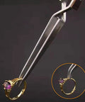 Precision Cross Tip Soldering Tweezers For Hot Welding Electronics Circuit Board Repair Clamps with a golden ring grasped securely.