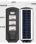 Badass Heavy Duty 350W Solar Floodlight With Photocensor And Motion Sensor Waterproof IP67 Outdoor Yard Security Lighting, controls and solar panel.