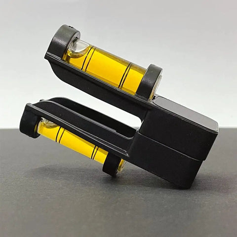Close-up of Magnetic Gunsmithing Tools Kit With Level and Scope Mounting Leveler for Rifles, dual bubble level design.