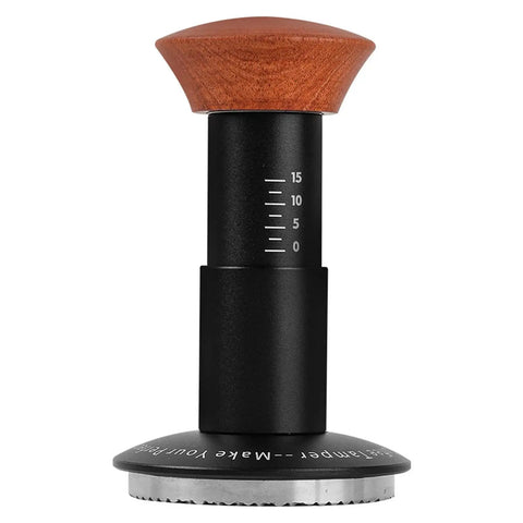 Heavy Hitter Spring Loaded Coffee Tamper With Precision Distribution Leveler And Clear Pressure Scale For Flawless Espresso Pucks featuring black stainless base and wooden handle.