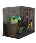 Interior view of 34 Cu Ft Horizontal Resin Storage Shed With Floor Included For Outdoor Use Weatherproof And Lockable Fits Small To Medium Trash Cans Generators And Garden Tools Stoney Black showcasing stored garden tools and supplies.