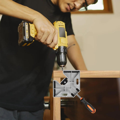 A person using Heavy Duty Corner Clamp 4 Pack 90 Degree Right Angle Clamp With Adjustable Aluminum Alloy Swing Jaw And Single Handle for woodworking.