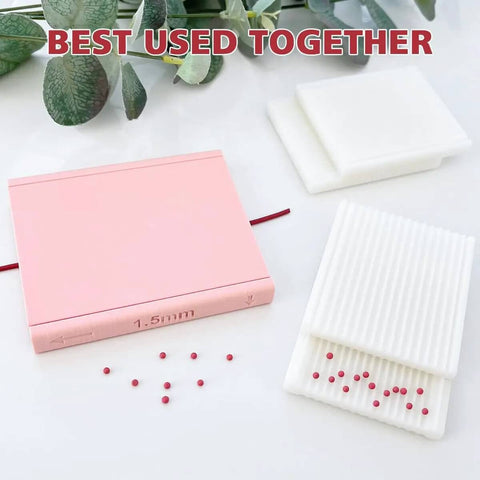 1.5mm bead maker kit from Four Bead Sizes Polymer Clay Bead Roller Kit with molds for clay crafting on a white surface with leaves