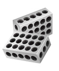 Angled front view of a pair of silver machinist 1-2-3 blocks with 23 holes