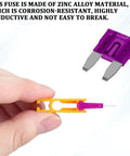 Hand holding puller tool with mini blade fuse from 120Piece Mini Blade Fuse Kit With Puller Tool Color Coded Inserts All In One Auto Fuse Set